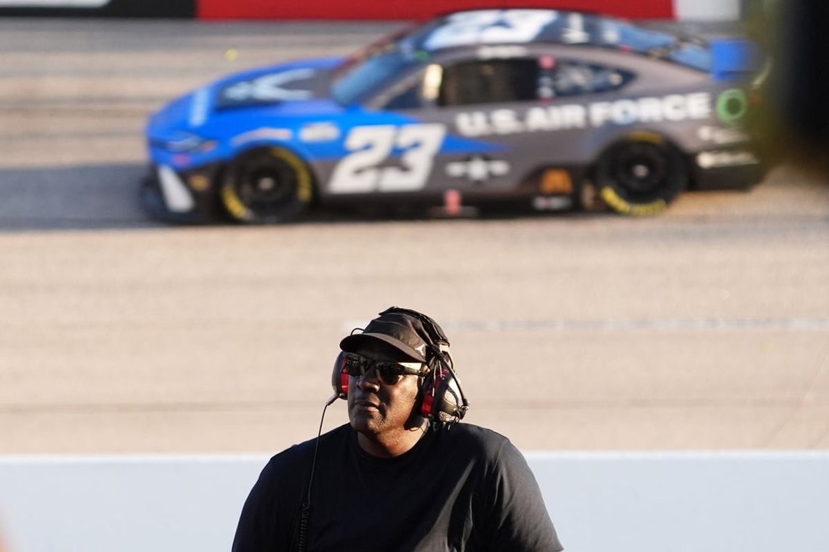 Sep 1, 2024; Darlington, South Carolina, USA; NASCAR Cup Series Team 23XI owner Michael Jordan watches a video board as NASCAR Cup Series driver Bubba Wallace (23) races during the Cook Out Southern 500 at Darlington Raceway. Mandatory Credit: Jasen Vinlove-Imagn Images