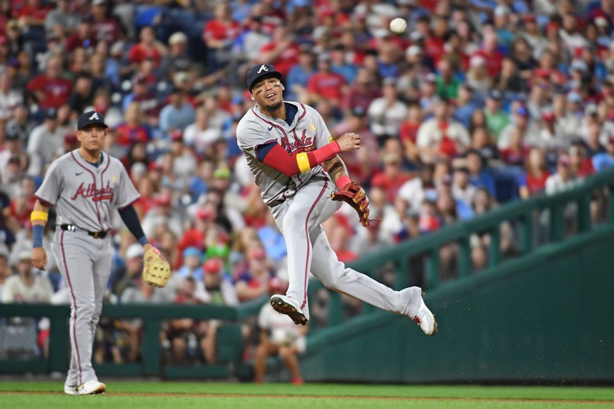 Sep 1, 2024; Philadelphia, Pennsylvania, USA; Atlanta Braves shortstop Orlando Arcia (11) throws to first base against the Philadelphia Phillies during the fifth inning at Citizens Bank Park. Mandatory Credit: Eric Hartline-USA TODAY Sports