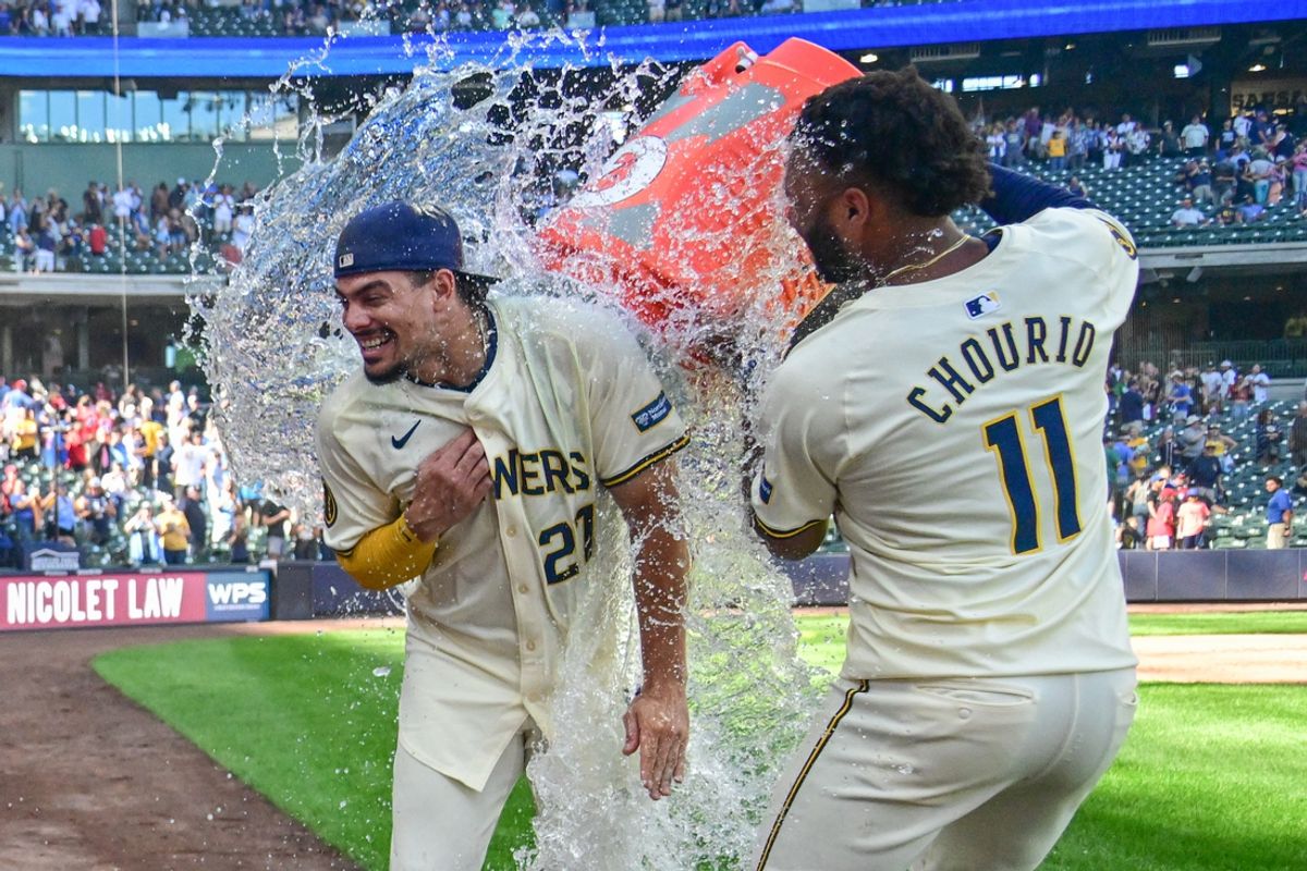 Sep 2, 2024; Milwaukee, Wisconsin, USA;  Milwaukee Brewers shortstop Willy Adames (27) is dunked by Milwaukee Brewers left fielder Jackson Chourio (11) after beating the St. Louis Cardinals at American Family Field. Mandatory Credit: Benny Sieu-USA TODAY Sports