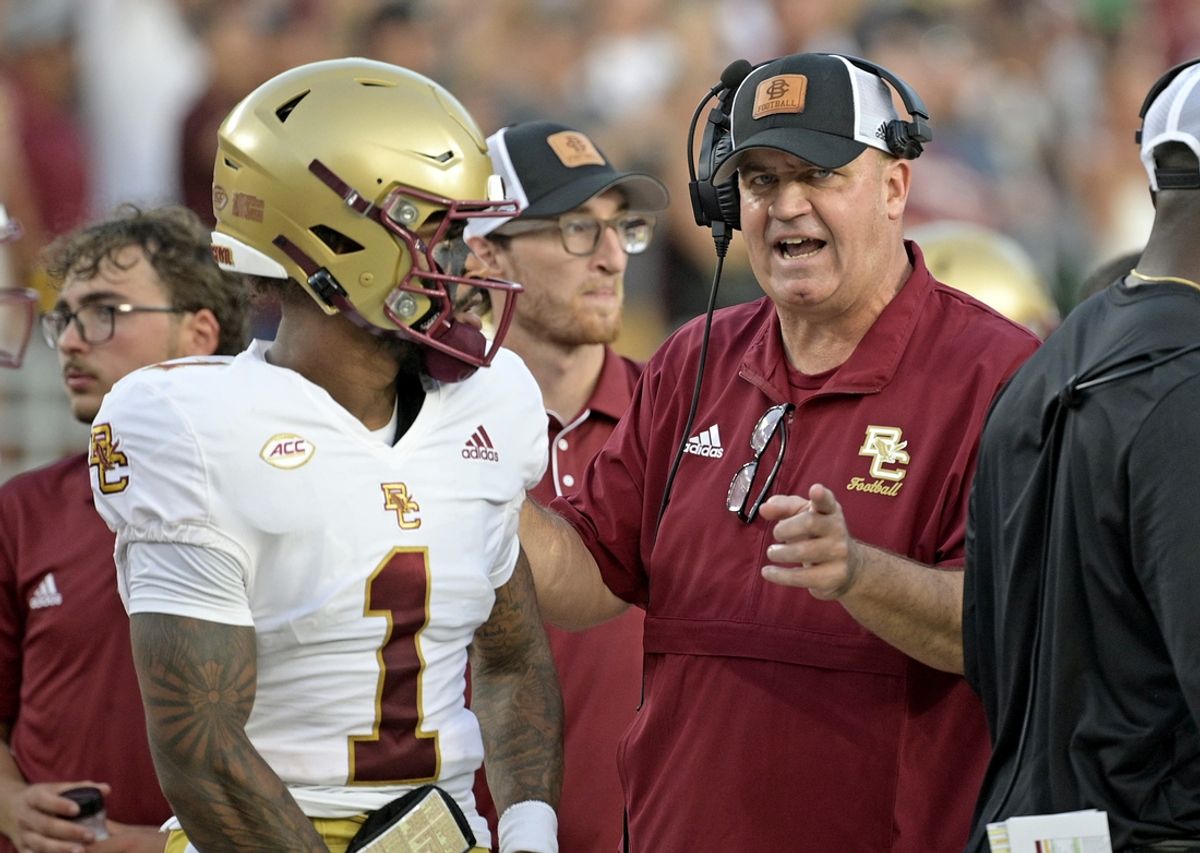 Sep 2, 2024; Tallahassee, Florida, USA; Boston College Eagles quarterback Thomas Castellanos (1) speaks with head coach Bill O'Brien before the game against the Florida State Seminoles at Doak S. Campbell Stadium. Mandatory Credit: Melina Myers-Imagn Images
