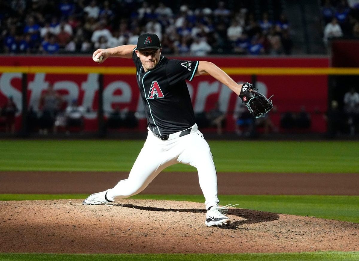 Arizona Diamondbacks pitcher Paul Sewald (38) throws to the Los Angeles Dodgers in the ninth inning at Chase Field on Sept. 2, 2024, in Phoenix.