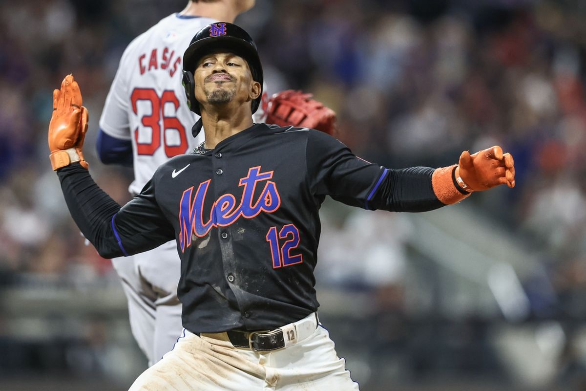 Sep 2, 2024; New York City, New York, USA;  New York Mets shortstop Francisco Lindor (12) celebrates after hitting a RBI single in the fourth inning against the Boston Red Sox at Citi Field. Mandatory Credit: Wendell Cruz-USA TODAY Sports