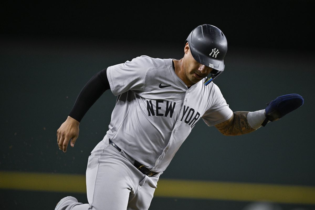Sep 2, 2024; Arlington, Texas, USA; New York Yankees second baseman Gleyber Torres (25) scores against the Texas Rangers during the sixth inning at Globe Life Field. Mandatory Credit: Jerome Miron-USA TODAY Sports