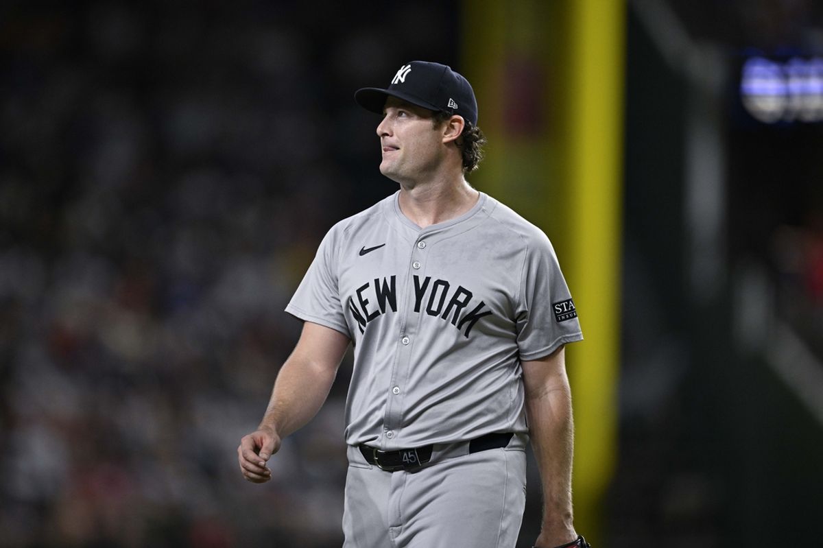 Sep 2, 2024; Arlington, Texas, USA; New York Yankees starting pitcher Gerrit Cole (45) comes off the field after pitching against the Texas Rangers at Globe Life Field. Mandatory Credit: Jerome Miron-USA TODAY Sports