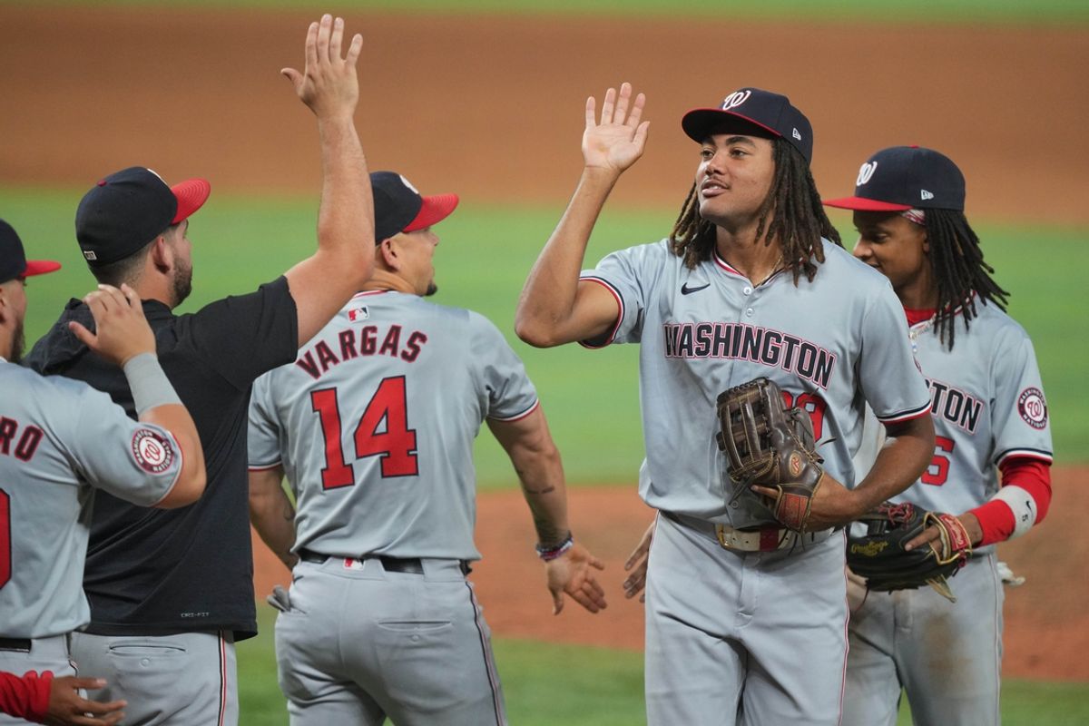 Sep 3, 2024; Miami, Florida, USA;  Washington Nationals left fielder James Wood (29) celebrates a victory over the Miami Marlins at loanDepot Park. Mandatory Credit: Jim Rassol-Imagn Images.
