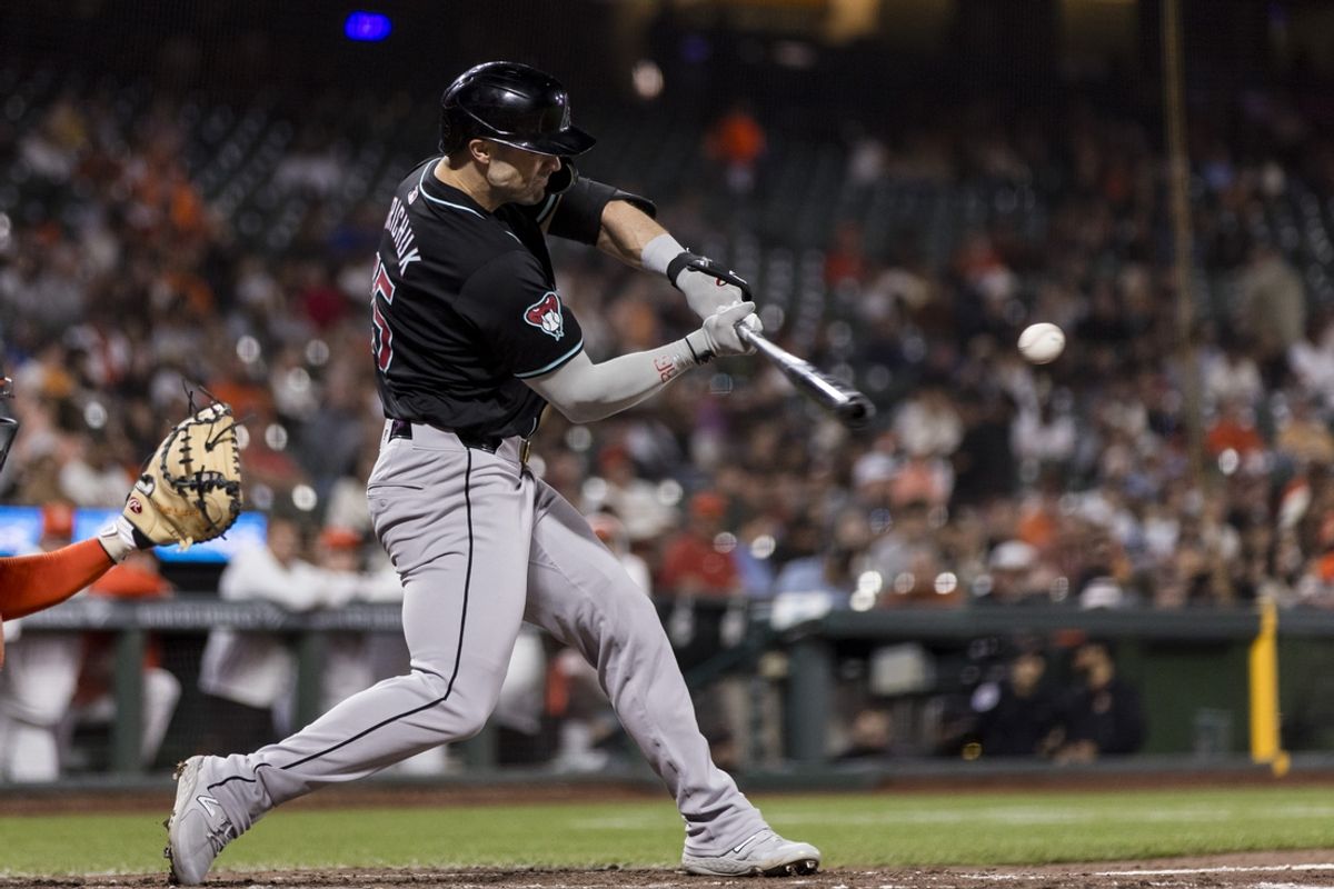 Sep 3, 2024; San Francisco, California, USA;  Arizona Diamondbacks left fielder Randal Grichuk (15) hits a solo home run against the San Francisco Giants during the fifth inning at Oracle Park. Mandatory Credit: John Hefti-Imagn Images