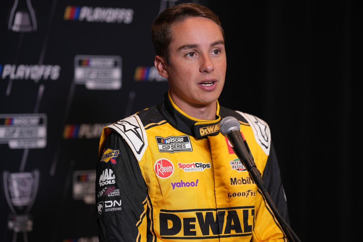 Sep 4, 2024; Charlotte, North Carolina, USA;  Christopher Bell speaks to media members during the NASCAR Playoffs Media Day at the Charlotte Convention Center. Mandatory Credit: Jim Dedmon-Imagn Images
