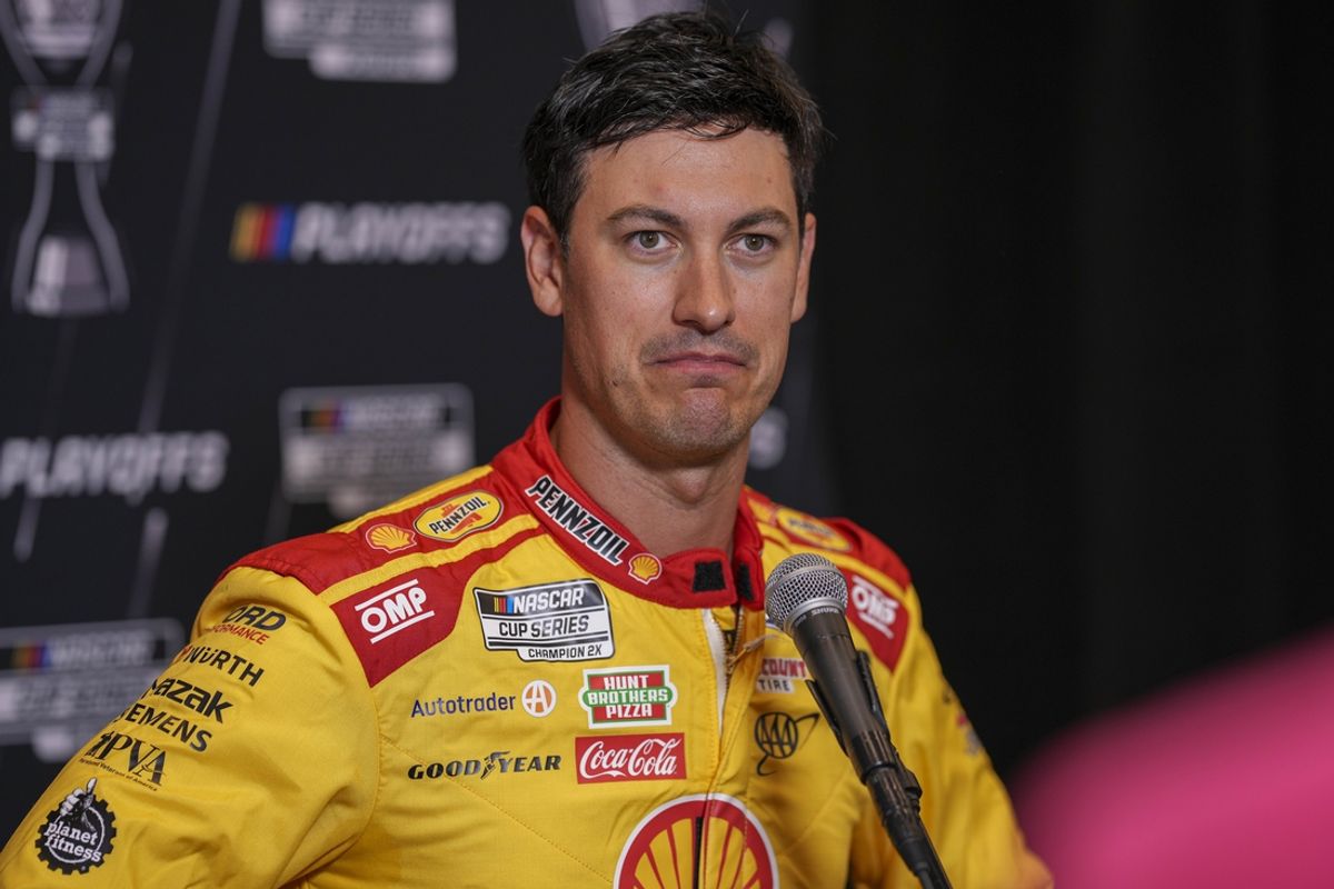 Sep 4, 2024; Charlotte, North Carolina, USA; Joey Logano speaks to media members during the NASCAR Playoffs Media Day at the Charlotte Convention Center. Mandatory Credit: Jim Dedmon-Imagn Images