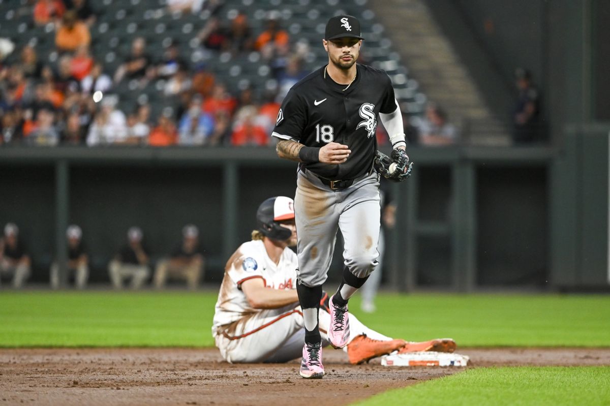 Sep 4, 2024; Baltimore, Maryland, USA; Chicago White Sox second base Jacob Amaya (18) runs to the dugout ofter catching Baltimore Orioles shortstop Gunnar Henderson (2) stealing to end the third inning  at Oriole Park at Camden Yards. Mandatory Credit: Tommy Gilligan -Imagn Images