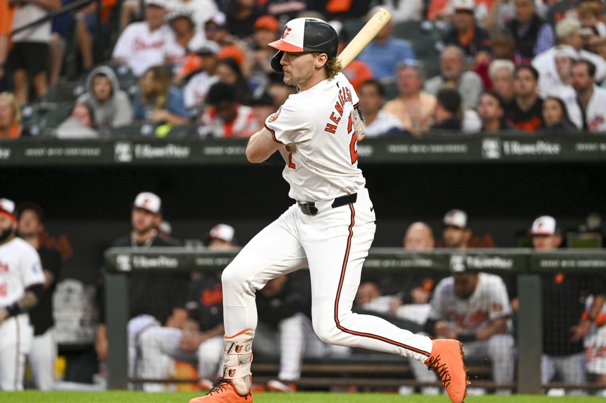 Sep 4, 2024; Baltimore, Maryland, USA;  Baltimore Orioles shortstop Gunnar Henderson (2) swings through a third inning single against the Chicago White Sox at Oriole Park at Camden Yards. Mandatory Credit: Tommy Gilligan -Imagn Images
