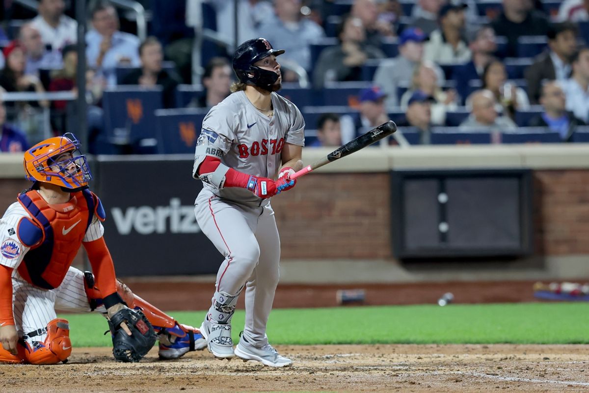 Sep 4, 2024; New York City, New York, USA; Boston Red Sox right fielder Wilyer Abreu (52) follows through on an RBI sacrifice fly against the New York Mets during the third inning at Citi Field. Mandatory Credit: Brad Penner-Imagn Images