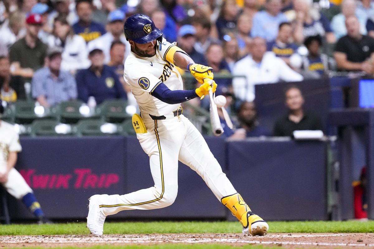 Sep 4, 2024; Milwaukee, Wisconsin, USA;  Milwaukee Brewers designated hitter Jackson Chourio (11) breaks his bat while hitting a double during the fourth inning against the St. Louis Cardinals at American Family Field. Mandatory Credit: Jeff Hanisch-Imagn Images