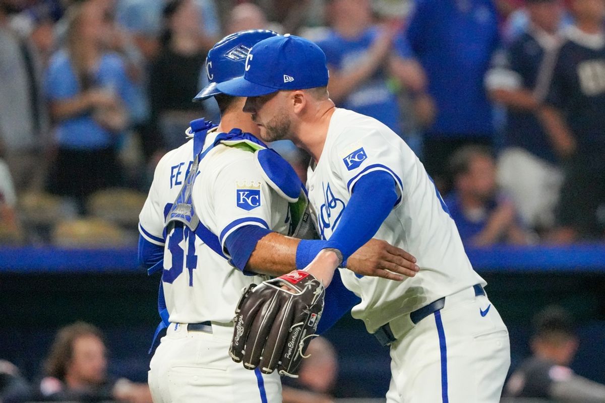 Sep 4, 2024; Kansas City, Missouri, USA; Kansas City Royals pitcher Lucas Erceg (60) celebrates with catcher Freddy Fermin (34) after the win over the Cleveland Guardians at Kauffman Stadium. Mandatory Credit: Denny Medley-Imagn Images