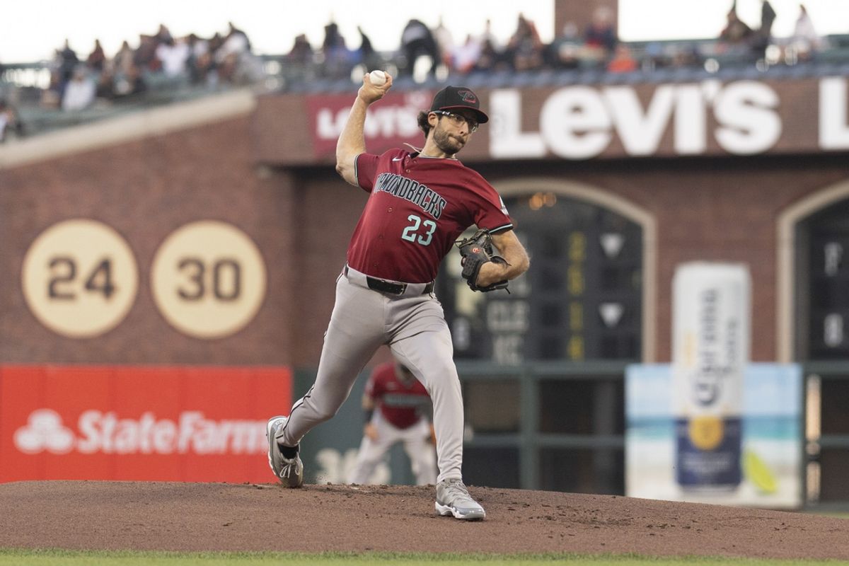 Sep 4, 2024; San Francisco, California, USA;  Arizona Diamondbacks pitcher Zac Gallen (23) pitches during the first inning against the San Francisco Giants at Oracle Park. Mandatory Credit: Stan Szeto-Imagn Images