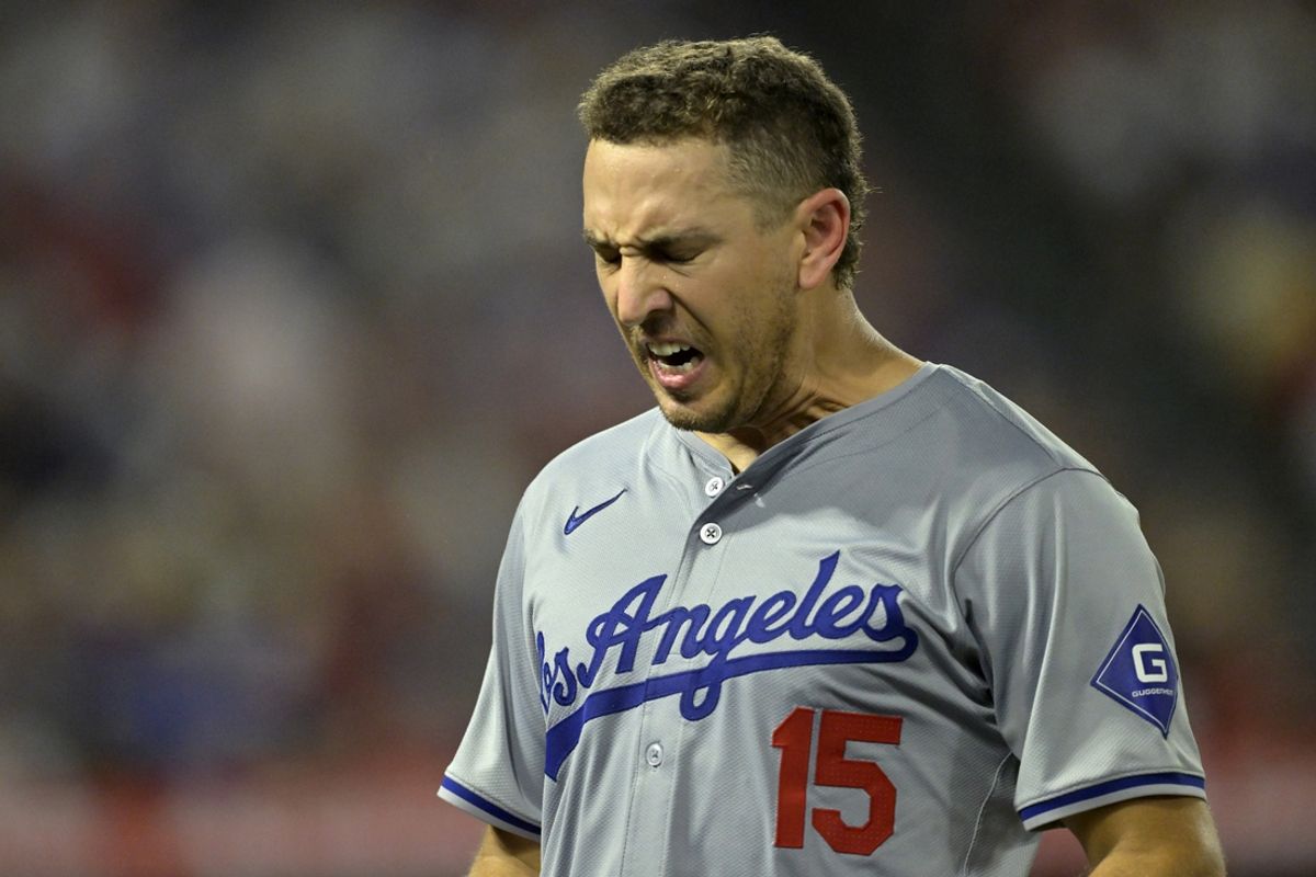 Sep 4, 2024; Anaheim, California, USA; Los Angeles Dodgers catcher Austin Barnes (15) reacts after a ground out in the seventh inning against the Los Angeles Angels at Angel Stadium. Mandatory Credit: Jayne Kamin-Oncea-Imagn Images