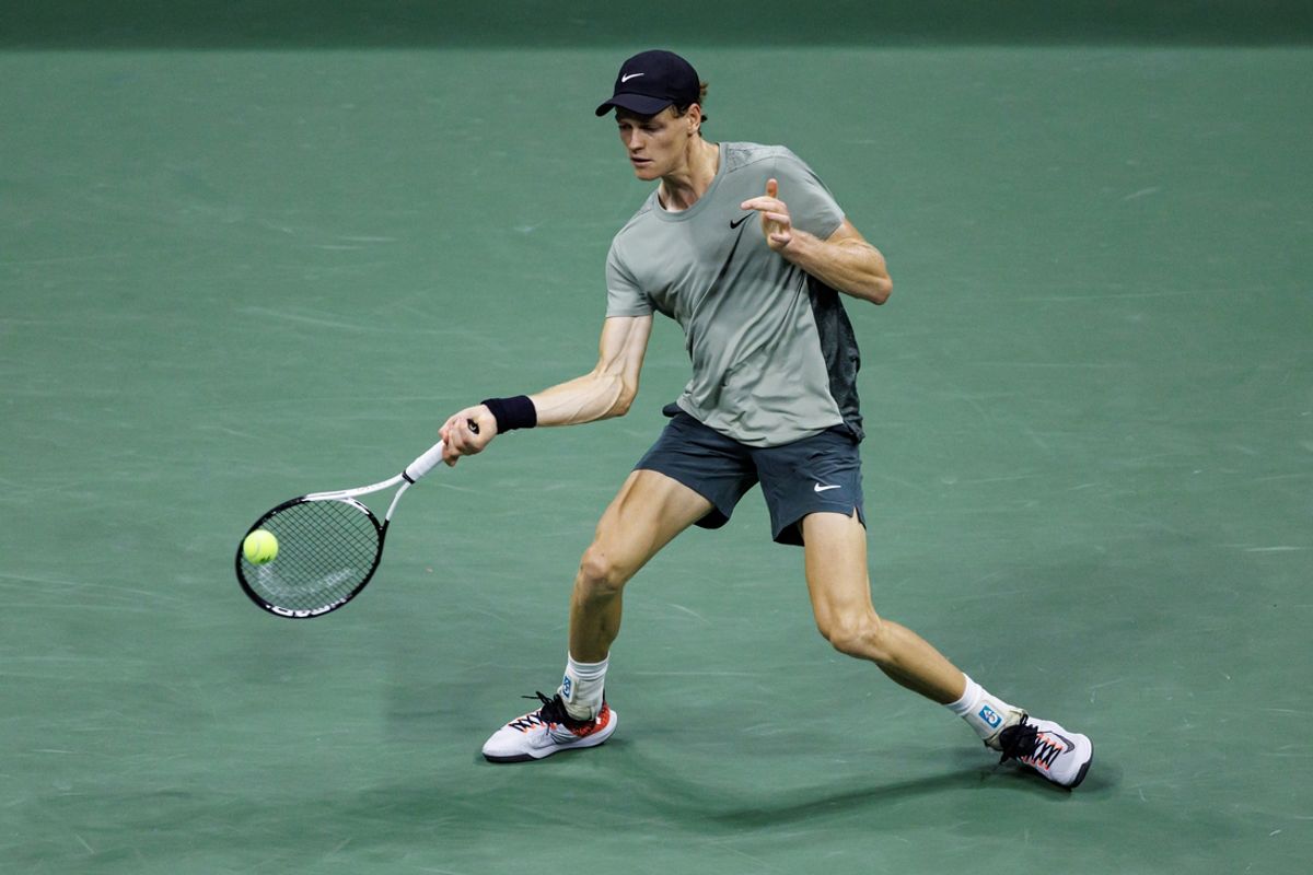 Sep 3, 2024; Flushing, NY, USA; Jannik Sinner of Italy returns the ball during his match against Daniil Medvedev of Russia on day ten of the U.S. Open tennis tournament at the USTA Billie Jean King National Tennis Center. Mandatory Credit: Mike Frey-Imagn Images