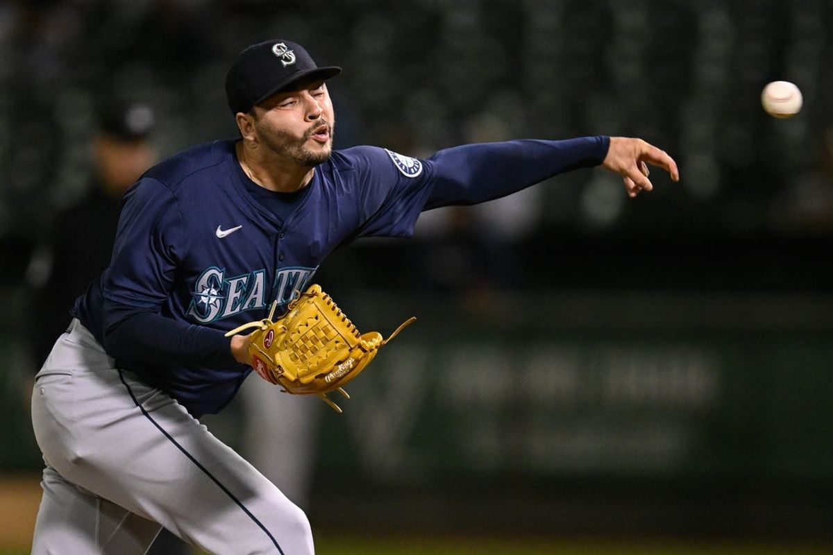 Sep 4, 2024; Oakland, California, USA; Seattle Mariners pitcher Tayler Saucedo (60) throws against the Oakland Athletics in the seventh inning at Oakland-Alameda County Coliseum. Mandatory Credit: Eakin Howard-Imagn Images