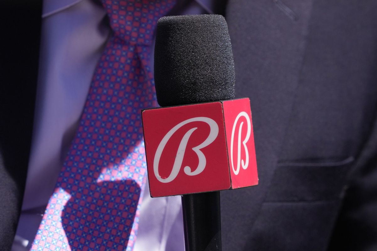 Sep 1, 2024; San Francisco, California, USA; Miami Marlins in-game reporter Craig Minervini holds a microphone with a Bally sports mic flag before the game against the San Francisco Giants at Oracle Park. Mandatory Credit: Darren Yamashita-Imagn Images