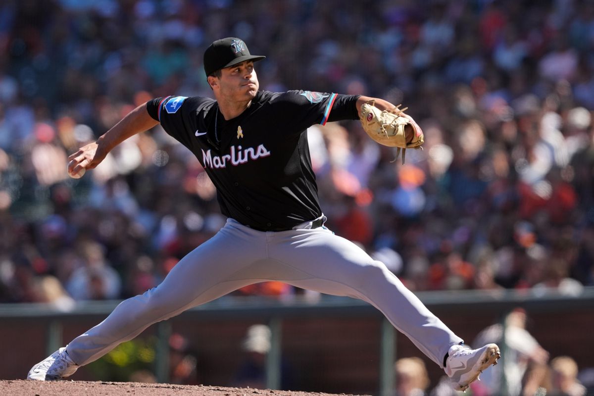 Sep 1, 2024; San Francisco, California, USA; Miami Marlins relief pitcher John McMillon (66) throws a pitch against the San Francisco Giants during the eighth inning at Oracle Park. Mandatory Credit: Darren Yamashita-Imagn Images