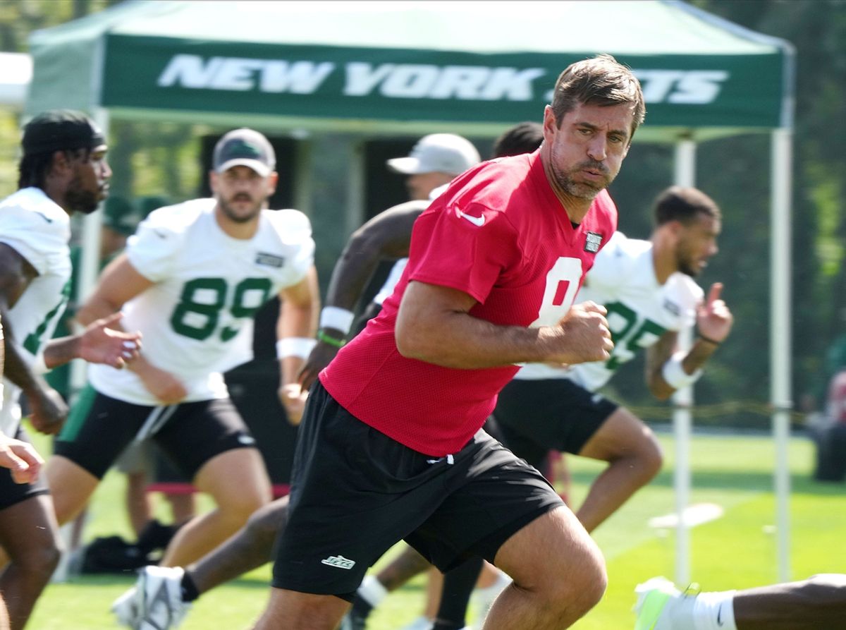 Quarterback Aaron Rodgers and the New York Jets practice during training camp on July 27, 2024.