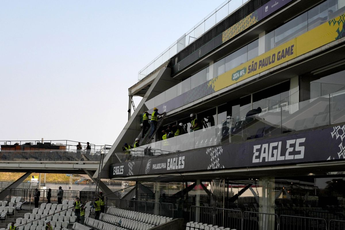 Sep 5, 2024; Sao Paolo, Brazil; Workers erect signage prior to the 2024 NFL Sao Paolo game between the Philadelphia Eagles and the Green Bay Packers at Neo Química Arena. Mandatory Credit: Kirby Lee-Imagn Images