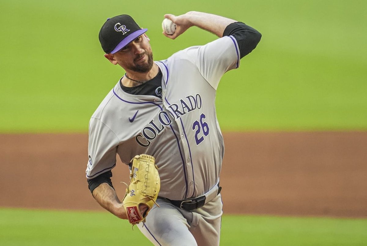 Sep 5, 2024; Cumberland, Georgia, USA; Colorado Rockies starting pitcher Austin Gomber (26) pitches against the Atlanta Braves during the first inning at Truist Park. Mandatory Credit: Dale Zanine-Imagn Images