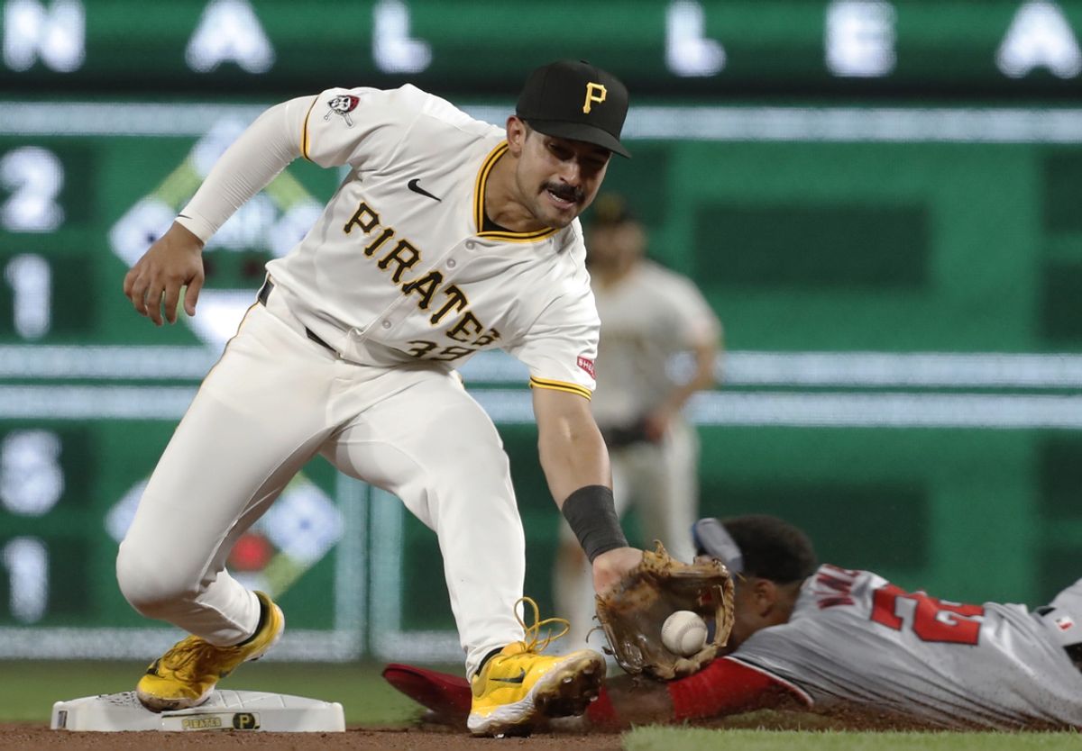 Sep 5, 2024; Pittsburgh, Pennsylvania, USA;  Pittsburgh Pirates second baseman Nick Gonzales (39) takes a throw at second base to record a force-out of Washington Nationals shortstop Nasim Nunez (26) during the seventh inning at PNC Park. Mandatory Credit: Charles LeClaire-Imagn Images