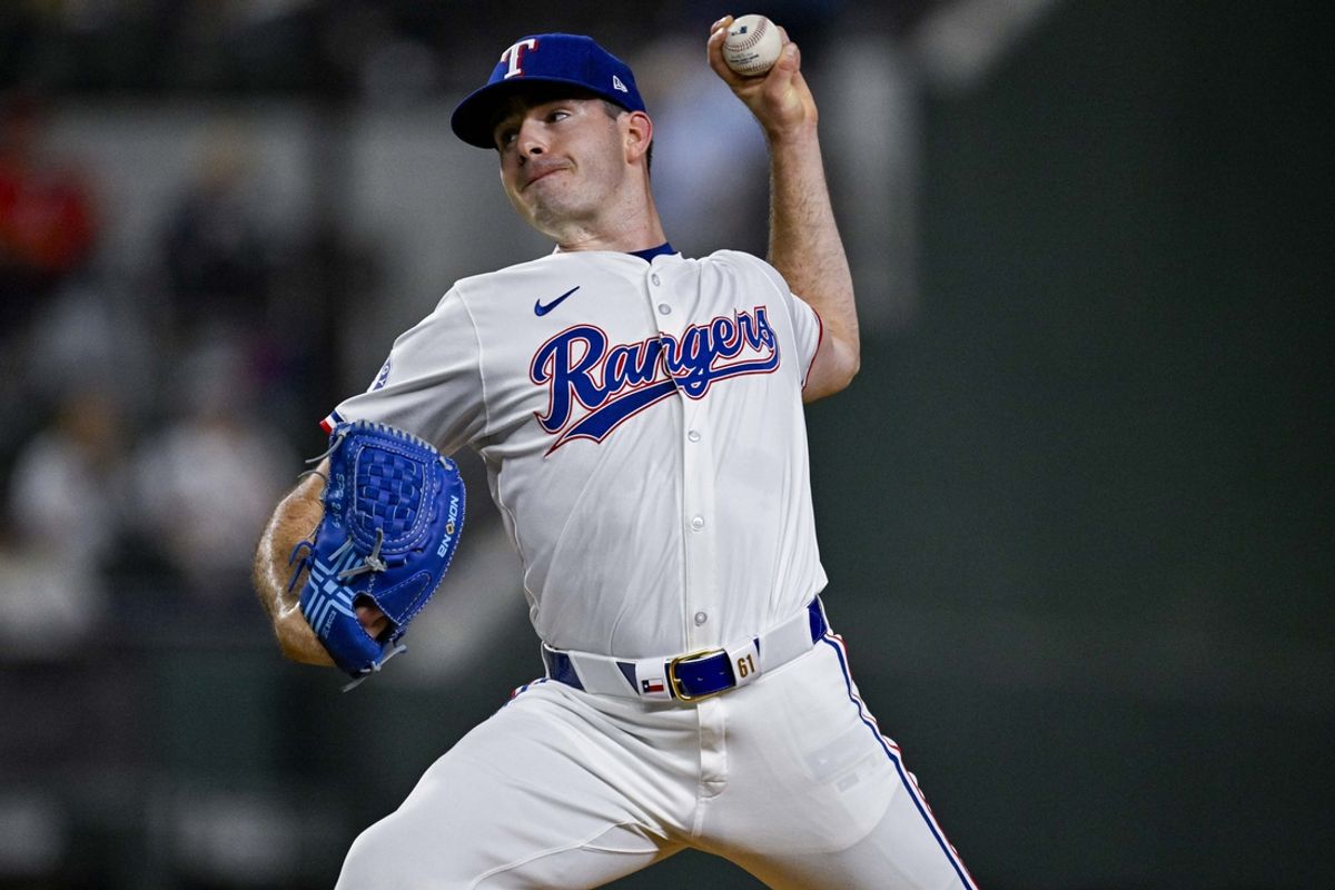 Sep 5, 2024; Arlington, Texas, USA; Texas Rangers starting pitcher Cody Bradford (61) pitches against the Los Angeles Angels during the second inning at Globe Life Field. Mandatory Credit: Jerome Miron-Imagn Images