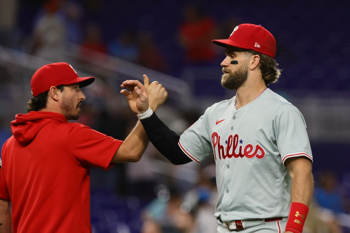 Sep 5, 2024; Miami, Florida, USA; Philadelphia Phillies first baseman Bryce Harper (3) celebrates with teammates after the game against the Miami Marlins at loanDepot Park. Mandatory Credit: Sam Navarro-Imagn Images