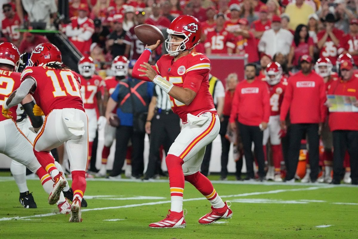 Sep 5, 2024; Kansas City, Missouri, USA; Kansas City Chiefs quarterback Patrick Mahomes (15) throws a pass against the Baltimore Ravens during the first half at GEHA Field at Arrowhead Stadium. Mandatory Credit: Denny Medley-Imagn Images
