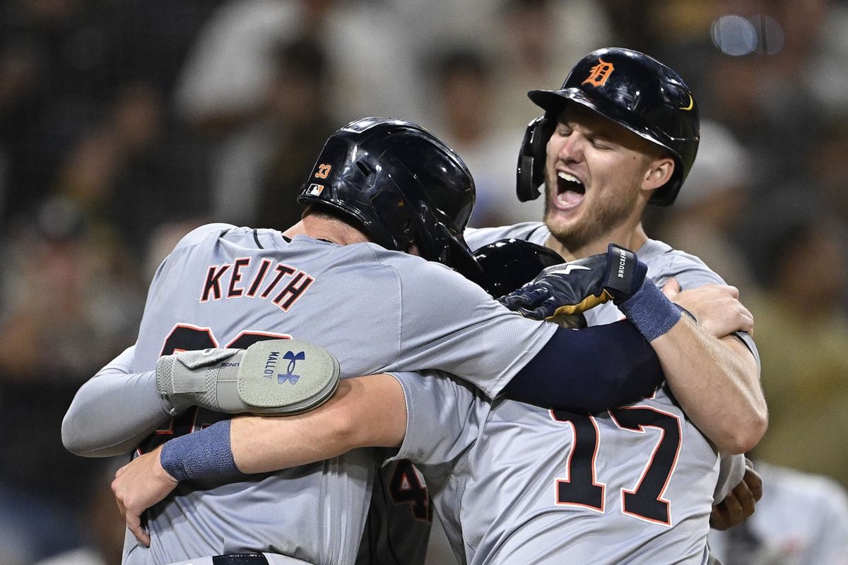 Sep 5, 2024; San Diego, California, USA; Detroit Tigers center fielder Parker Meadows (22), right, is congratulated after hitting a grand slam during the ninth inning against the San Diego Padres at Petco Park. Mandatory Credit: Denis Poroy-Imagn Images