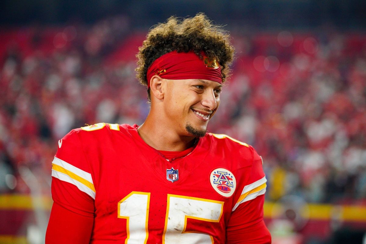 Sep 5, 2024; Kansas City, Missouri, USA; Kansas City Chiefs quarterback Patrick Mahomes (15) speaks with media after the win over the Baltimore Ravens at GEHA Field at Arrowhead Stadium. Mandatory Credit: Denny Medley-Imagn Images