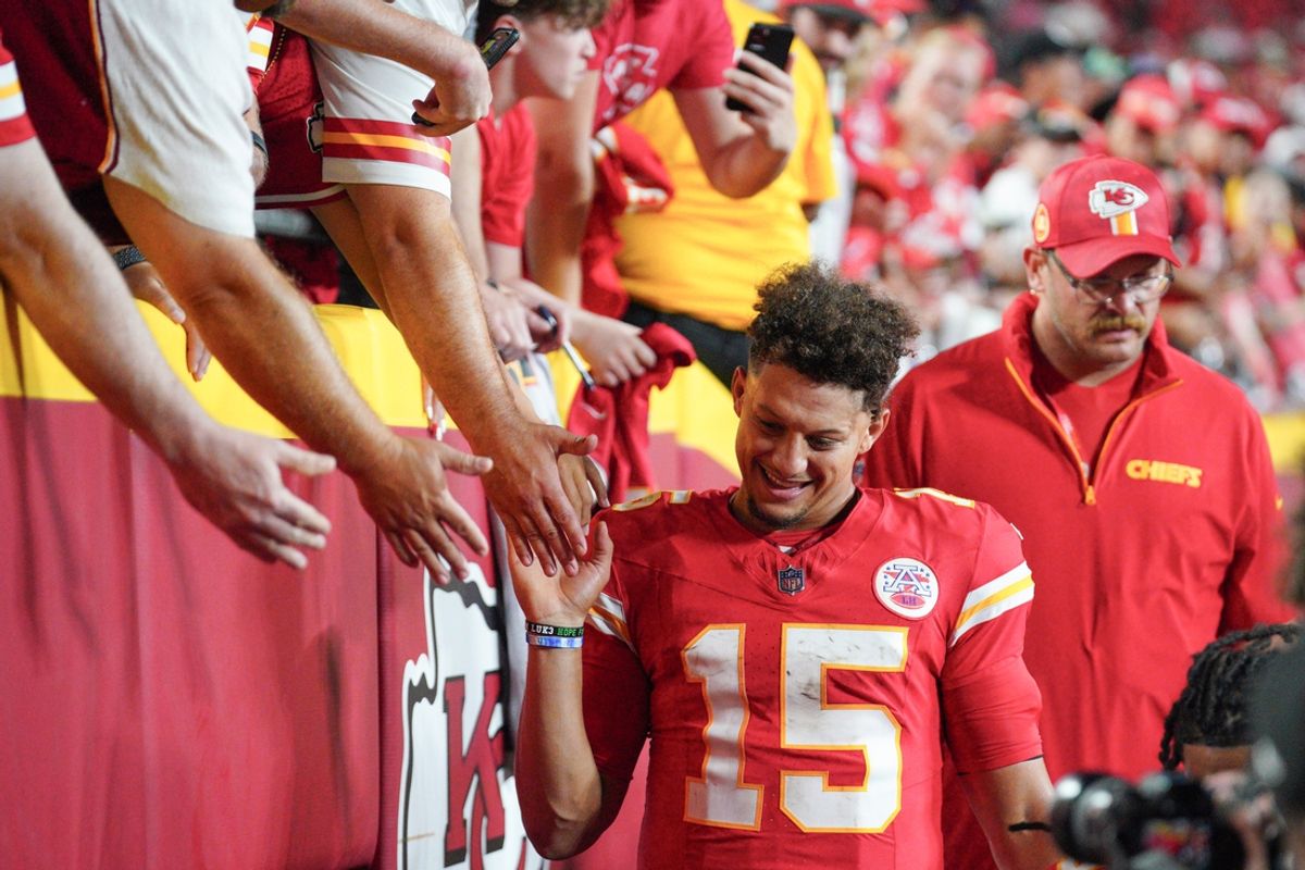 Sep 5, 2024; Kansas City, Missouri, USA; Kansas City Chiefs quarterback Patrick Mahomes (15) greets fans as he leaves the field after the win over the Baltimore Ravens at GEHA Field at Arrowhead Stadium. Mandatory Credit: Denny Medley-Imagn Images