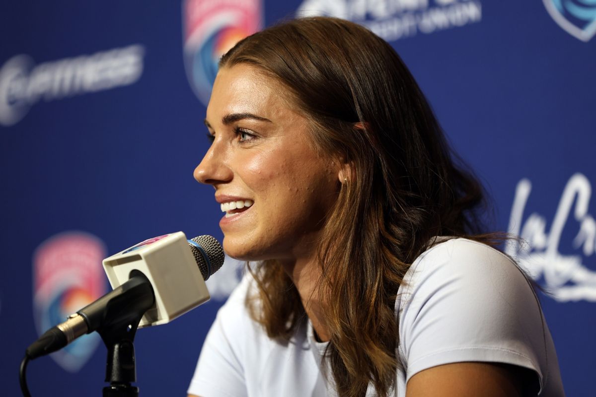 Sep 6, 2024; San Diego, California, USA; San Diego Wave FC forward Alex Morgan (13) speaks during a press conference announcing her retirement at Snapdragon Stadium. Mandatory Credit: Abe Arredondo-Imagn Images