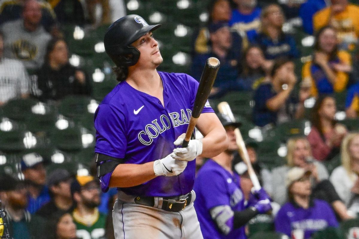 Sep 6, 2024; Milwaukee, Wisconsin, USA; Colorado Rockies first baseman Michael Toglia (4) hits a three-run home run in the sixth inning against the Milwaukee Brewers at American Family Field. Mandatory Credit: Benny Sieu-Imagn Images