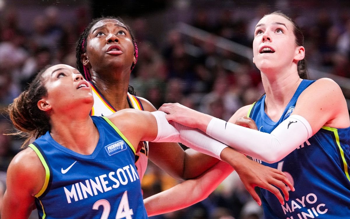 Minnesota Lynx forward Napheesa Collier (24), Indiana Fever forward Aliyah Boston (7), and Minnesota Lynx forward Bridget Carleton (6) watch a free throw Friday, Sept. 6, 2024, during a game between the Indiana Fever and the Minnesota Lynx at Gainbride Fieldhouse in Indianapolis.