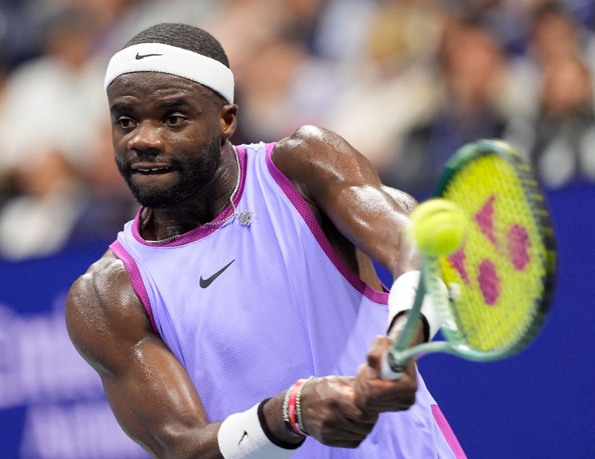 Sept 6, 2024; Flushing, NY, USA;    Frances Tiafoe (USA) hits to Taylor Fritz (USA) on day twelve of the 2024 U.S. Open tennis tournament at USTA Billie Jean King National Tennis Center. Mandatory Credit: Robert Deutsch-Imagn Images
