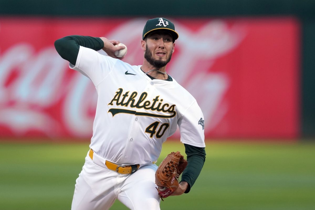 Sep 6, 2024; Oakland, California, USA; Oakland Athletics starting pitcher Mitch Spence (40) throws a pitch against the Detroit Tigers during the first inning at Oakland-Alameda County Coliseum. Mandatory Credit: Darren Yamashita-Imagn Images