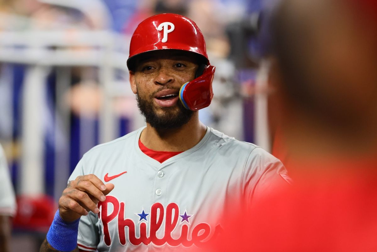Sep 6, 2024; Miami, Florida, USA; Philadelphia Phillies shortstop Edmundo Sosa (33) celebrates after scoring during the ninth inning against the Miami Marlins at loanDepot Park. Mandatory Credit: Sam Navarro-Imagn Images