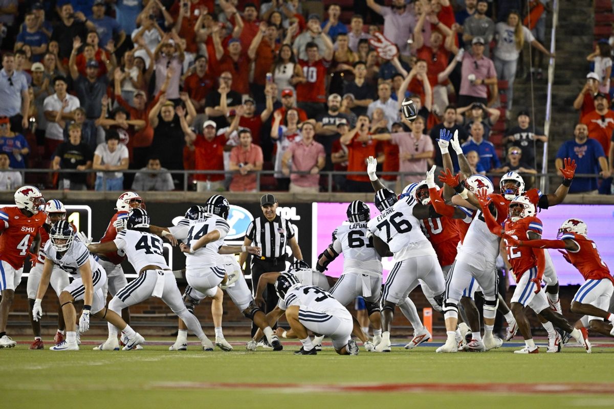 Sep 6, 2024; Dallas, Texas, USA; Brigham Young Cougars place kicker Will Ferrin (44) kicks the game winning field goal against the Southern Methodist Mustangs during the second half at Gerald J. Ford Stadium. Mandatory Credit: Jerome Miron-Imagn Images