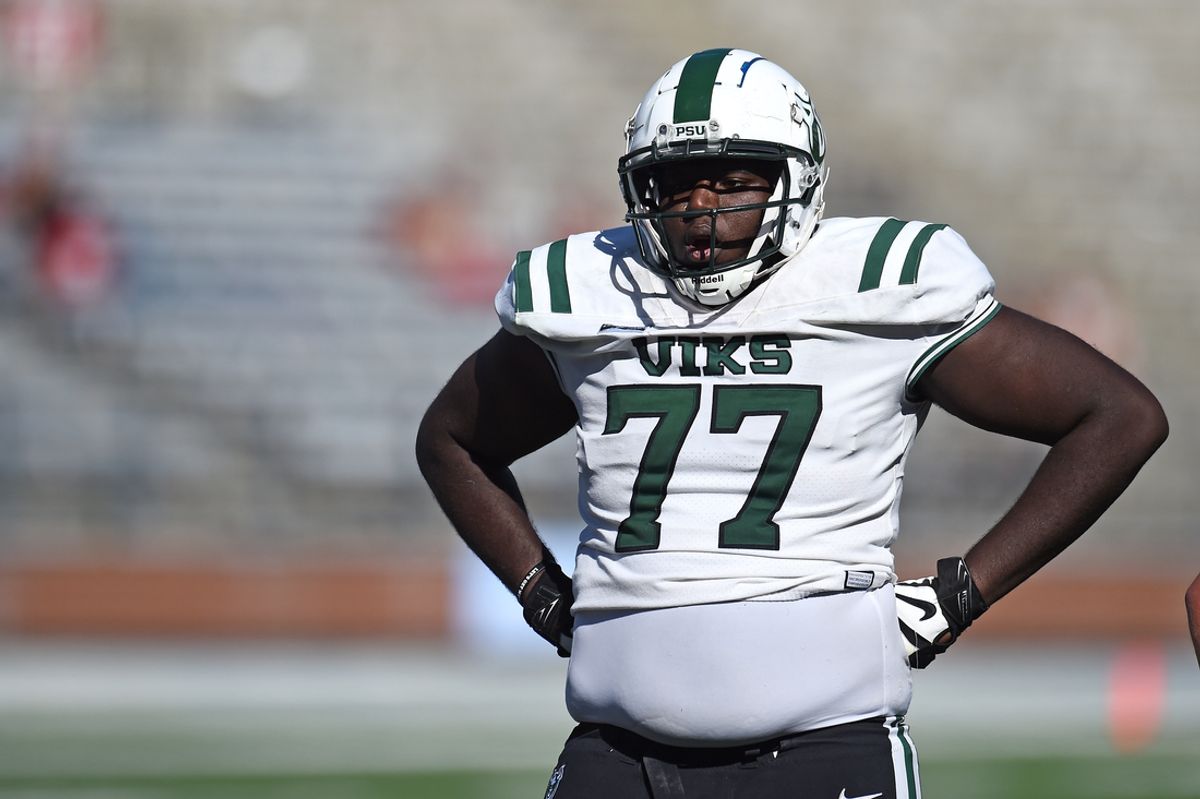 Aug 31, 2024; Pullman, Washington, USA;Portland State Vikings offensive lineman Jakob Belton (77) lines up for a play against the Washington State Cougars in the second half at Gesa Field at Martin Stadium. Mandatory Credit: James Snook-USA TODAY Sports