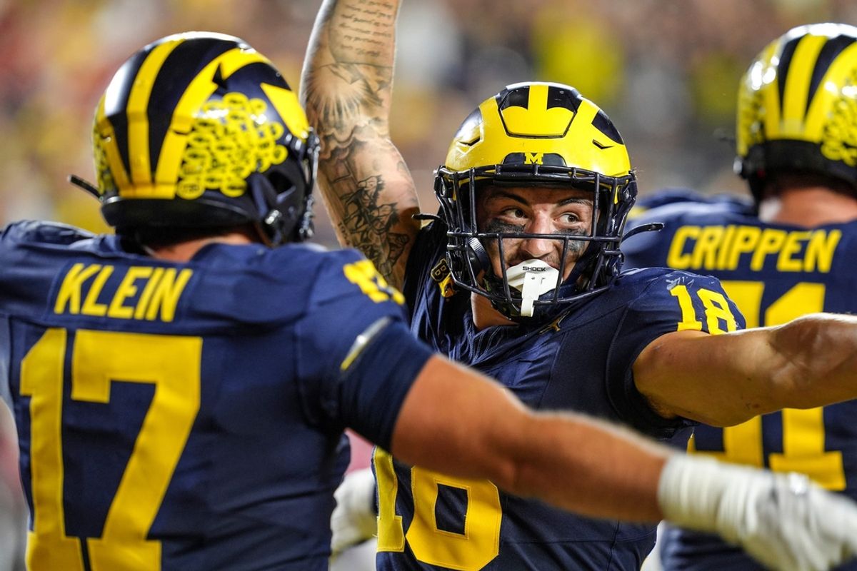 Michigan tight end Colston Loveland (18) celebrates his touchdown against Fresno State during the second half at Michigan Stadium in Ann Arbor on Saturday, Aug. 31, 2024.