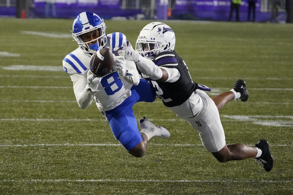 Sep 6, 2024; Evanston, Illinois, USA; Duke Blue Devils wide receiver Jordan Moore (8) canít make a catch as Northwestern Wildcats defensive back Evan Smith (12) defends him during the second half at Lanny and Sharon Martin Stadium. Mandatory Credit: David Banks-Imagn Images