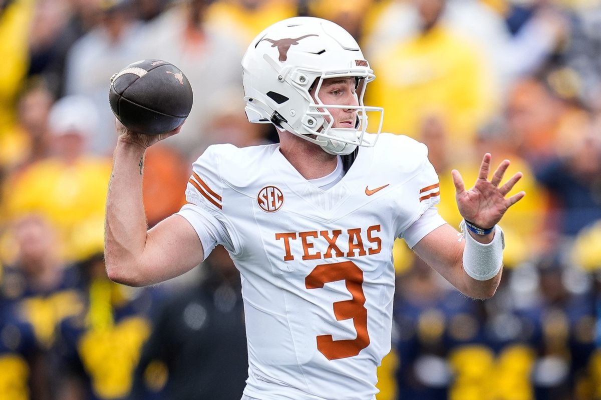 Texas quarterback Quinn Ewers (3) makes a pass against Michigan during the first half at Michigan Stadium in Ann Arbor on Saturday, September 7, 2024.