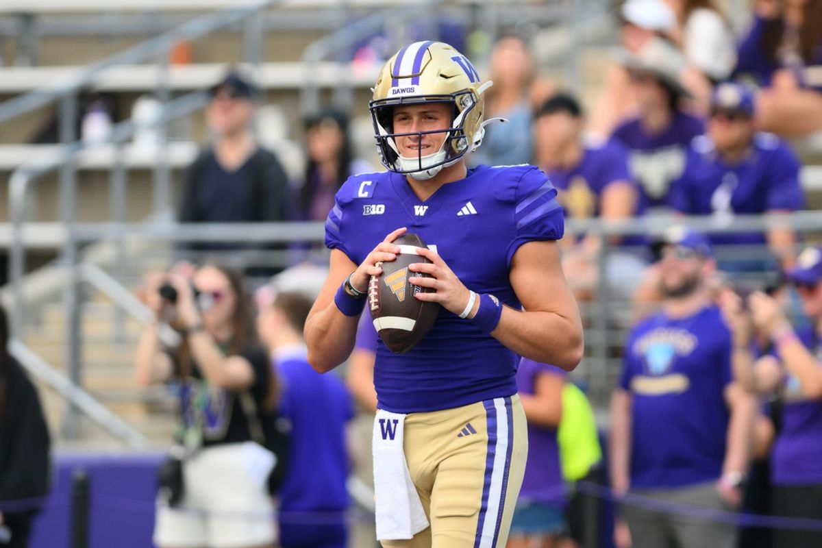 Sep 7, 2024; Seattle, Washington, USA; Washington Huskies quarterback Will Rogers (7) during warmups before the game against the Eastern Michigan Eagles at Alaska Airlines Field at Husky Stadium. Mandatory Credit: Steven Bisig-Imagn Images
