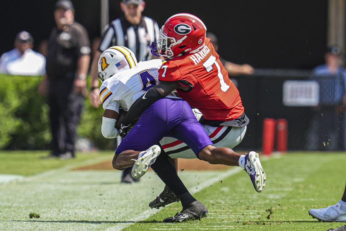 Sep 7, 2024; Athens, Georgia, USA; Georgia Bulldogs defensive back Daniel Harris (7) tackles Tennessee Tech Golden Eagles wide receiver Jay Parker (4) during the first half at Sanford Stadium. Mandatory Credit: Dale Zanine-Imagn Images