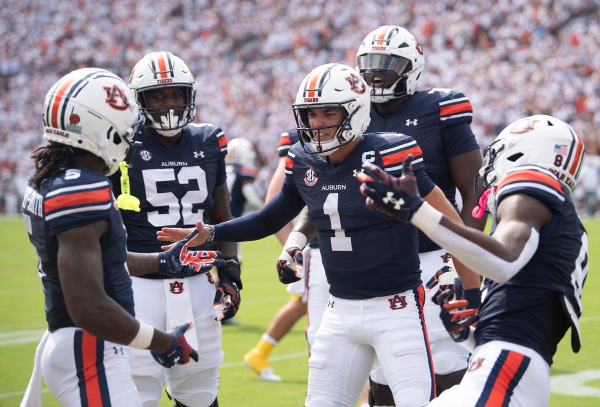 Auburn Tigers wide receiver KeAndre Lambert-Smith (5) and quarterback Payton Thorne (1) celebrate their touchdown connection as Auburn Tigers take on California Golden Bears at Jordan-Hare Stadium in Auburn, Ala., on Saturday, Sept. 7, 2024.