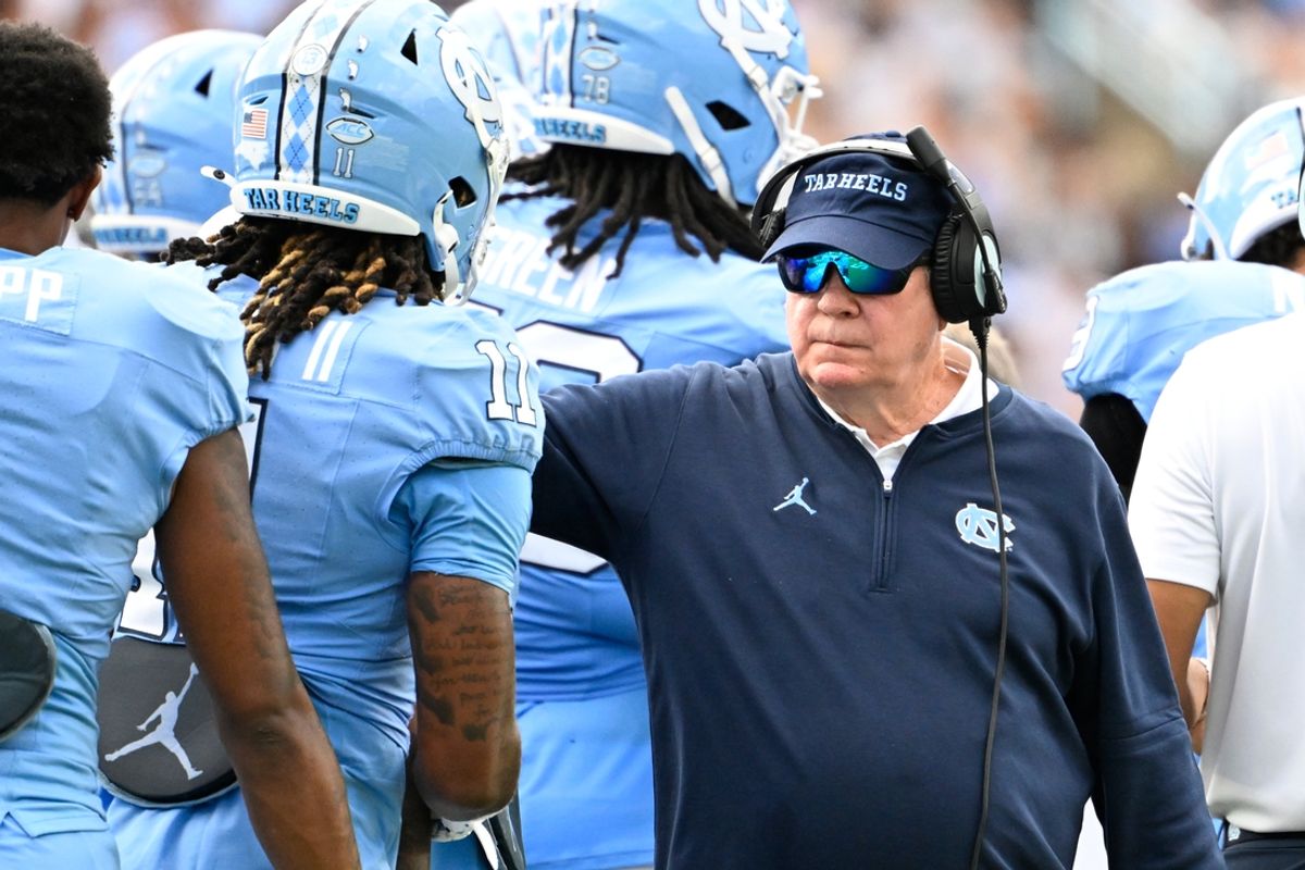 Sep 7, 2024; Chapel Hill, North Carolina, USA;  North Carolina Tar Heels coach Mack Brown with his players in the second quarter at Kenan Memorial Stadium. Mandatory Credit: Bob Donnan-Imagn Images