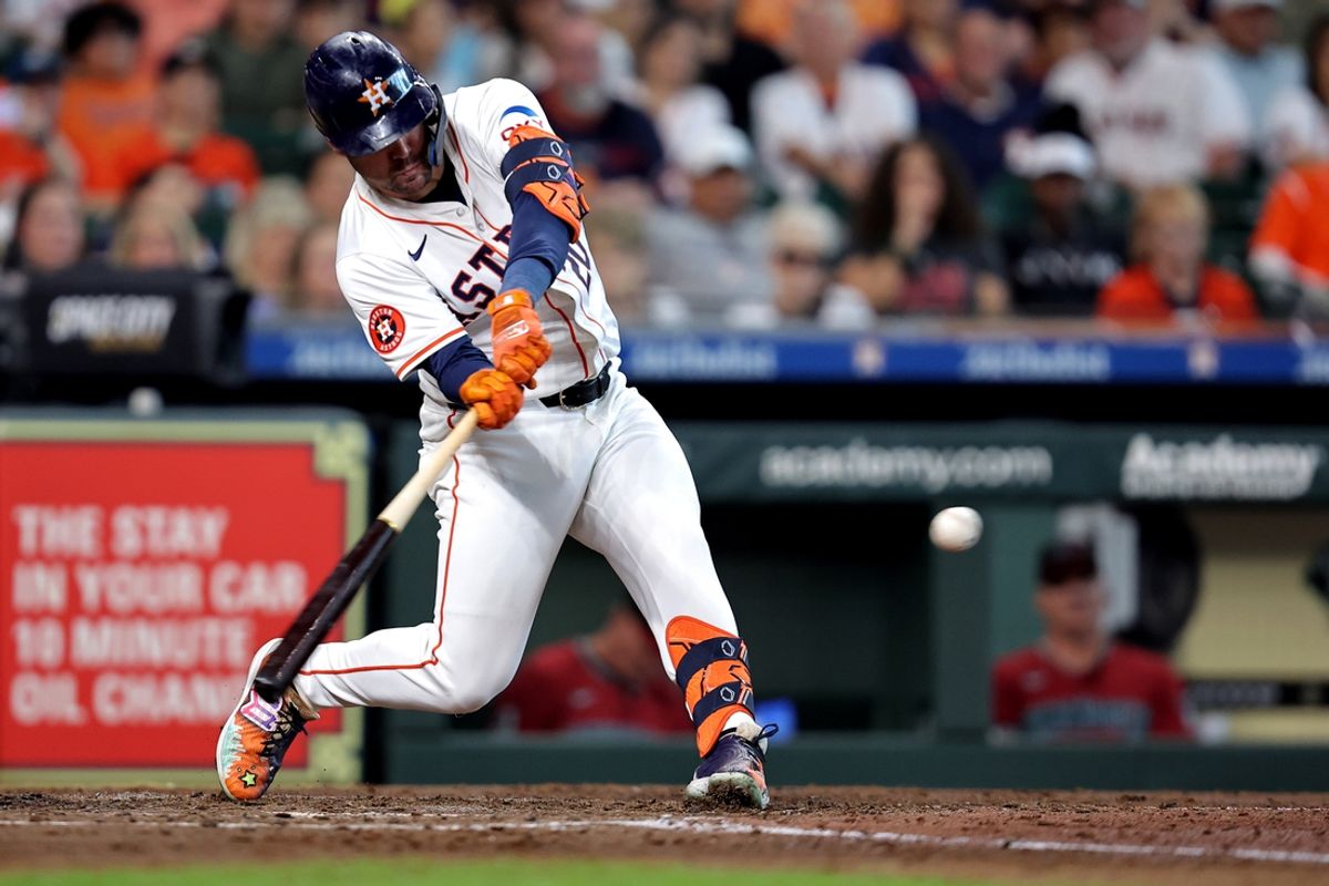 Sep 7, 2024; Houston, Texas, USA; Houston Astros left fielder Chas McCormick (20) hits an RBI single against the Arizona Diamondbacks during the fourth inning at Minute Maid Park. Mandatory Credit: Erik Williams-Imagn Images