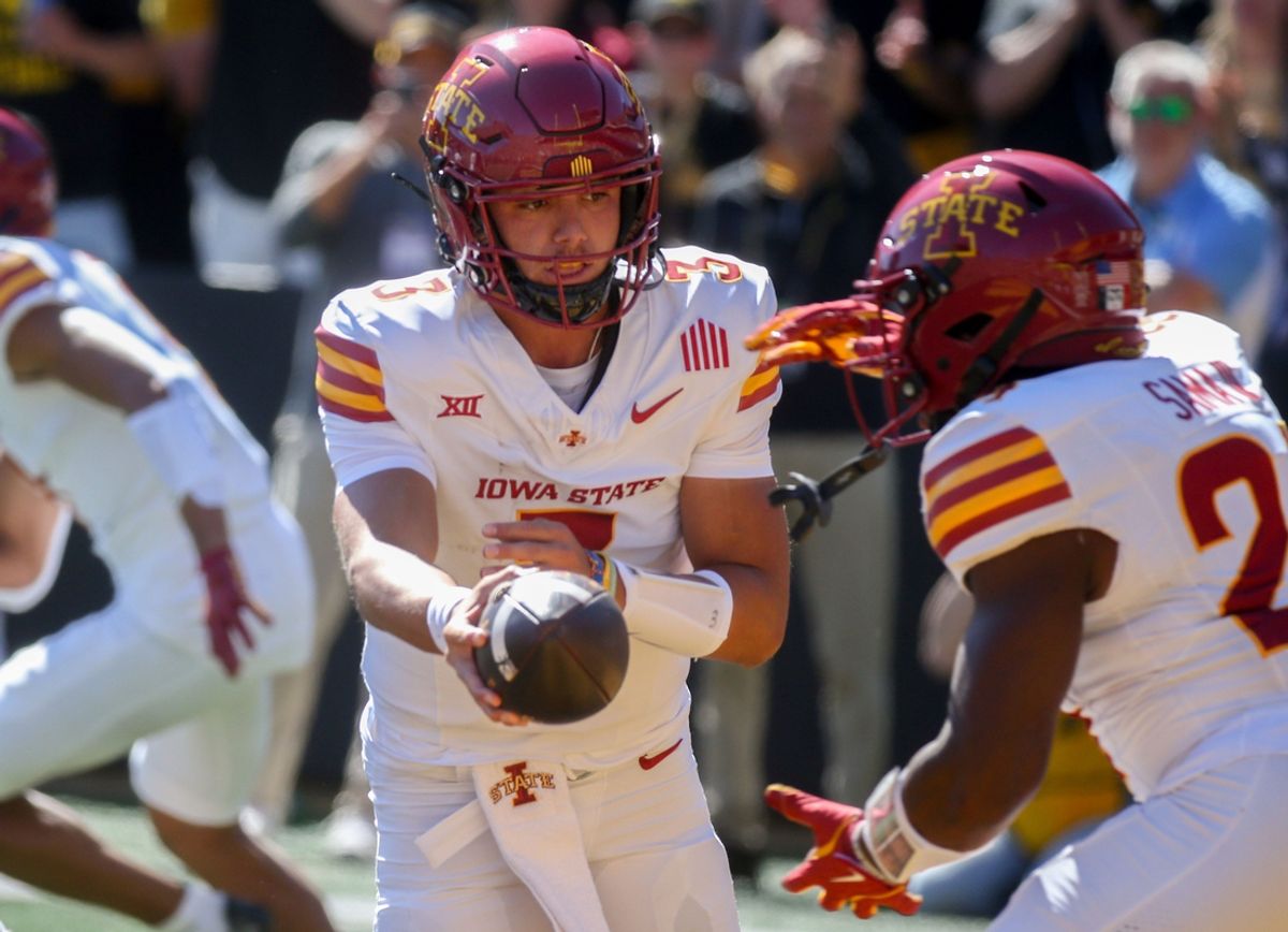 Iowa State’s Rocco Becht (3) hands off the ball to Abu Sama III (24) against Iowa during the CyHawk game Saturday, Sept. 7, 2024 at Kinnick Stadium in Iowa City, Iowa.